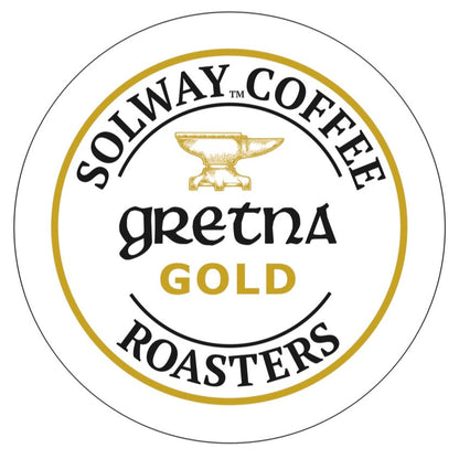 Logo of Solway Coffee Roasters Gretna Gold with a yellow anvil symbol on a white background.