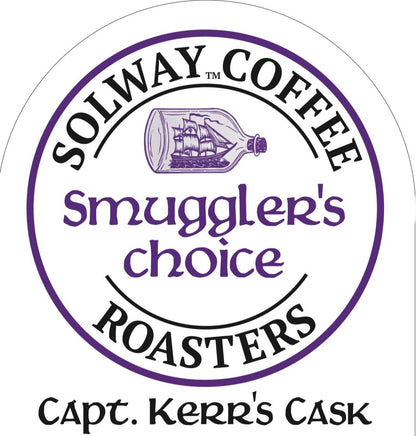 Logo of Solway Coffee Roasters Smuggler's Choice with a purple illustration of a ship in a bottle on a white background